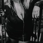 mature dominatrix in PVC